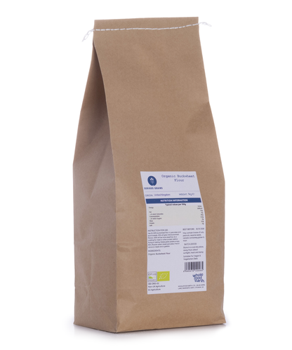 Organic buckwheat flour from Serious Grains in a 1kg bag, showcasing light brown, finely ground flour in a resealable package.