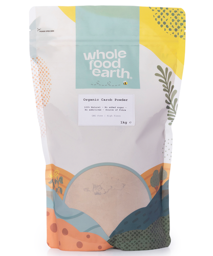Organic carob powder in a 1kg bag from Whole Food Earth, showcasing the light brown, fine-textured powder in a clear bag.