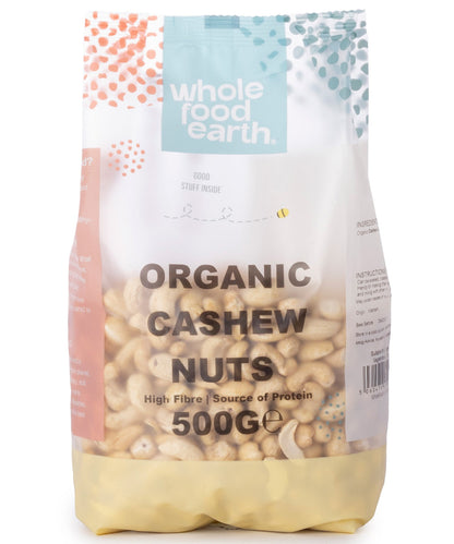 Whole Food Earth organic cashew nuts, whole and raw, in a 500g package, showing light beige, curved nuts with smooth surfaces.
