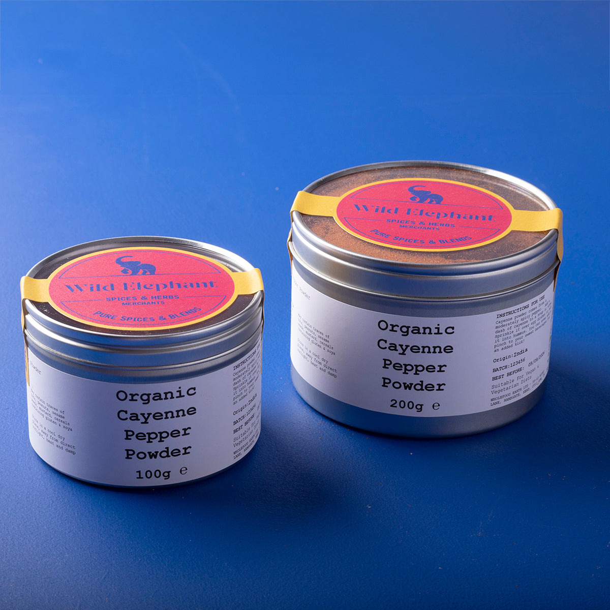 Organic Cayenne Pepper Powder by Wild Elephant in herbs and spices, shown in a clear container with vibrant red powder.