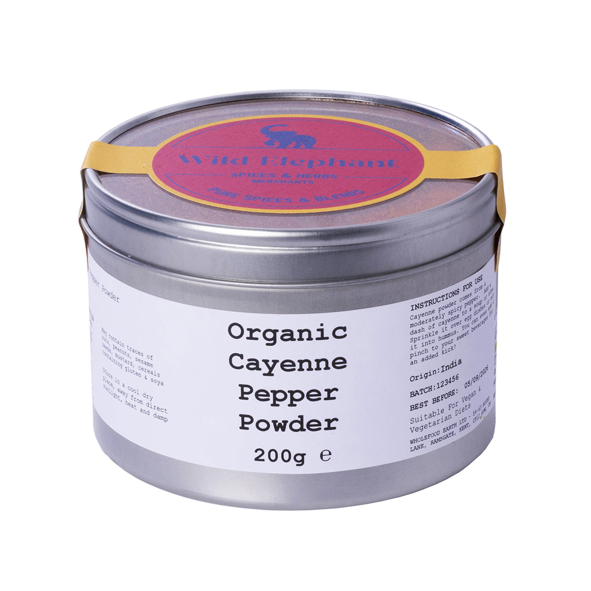 Organic cayenne pepper powder from Whole Food Earth, finely ground red spice in a clear jar, used for cooking and seasoning.