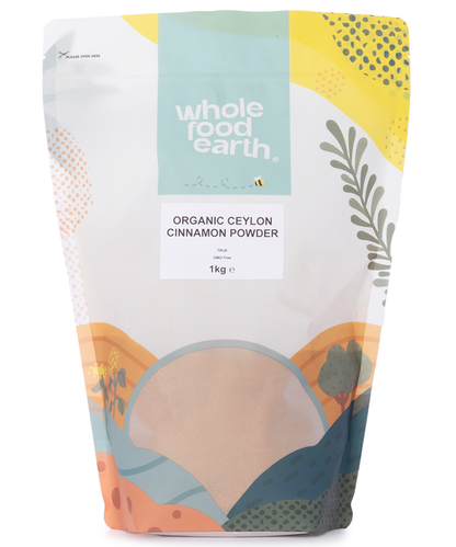 Organic Ceylon Cinnamon Powder from Whole Food Earth, finely ground herbal spice in a 1kg package, ideal for baking and cooking.