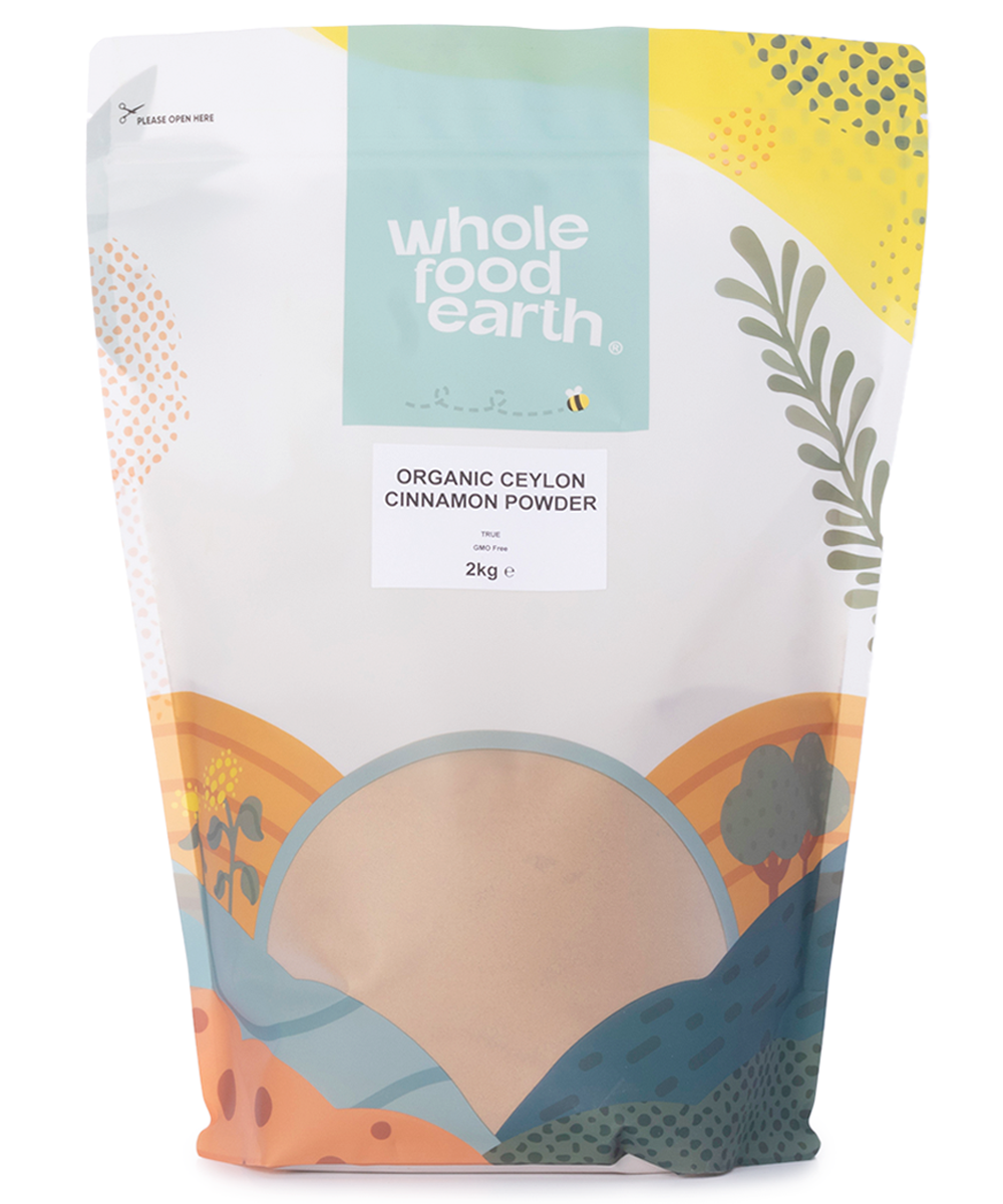 Organic Ceylon cinnamon powder from Whole Food Earth, showcasing fine, light brown spice in a clear container, herbal and aromatic.