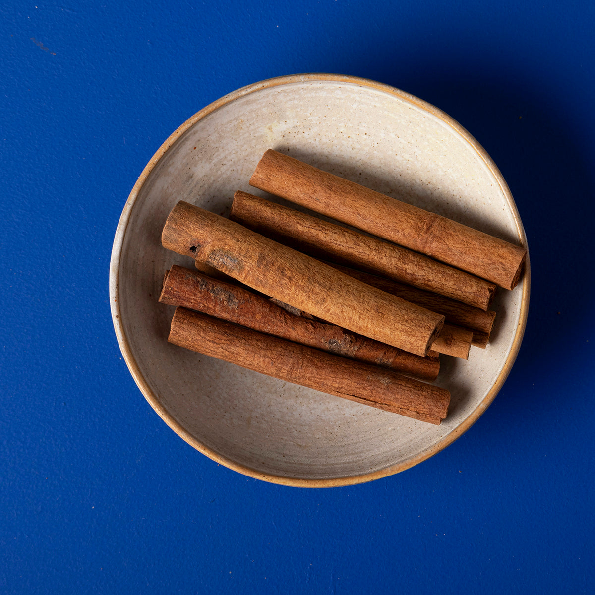 Organic cinnamon cassia sticks from Wild Elephant, 100g, shown in a clear image highlighting the whole aromatic spice.