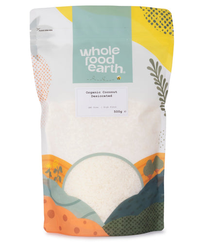Organic coconut desiccated from Whole Food Earth in a clear bag, showing shredded dried coconut pieces suitable for baking and snacking.