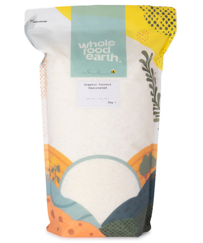 Organic coconut desiccated dried fruits in a 3kg bag from Whole Food Earth, showing shredded coconut ready for baking or snacking.