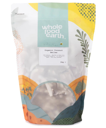 Organic coconut smiles dried fruit snack in a clear bag, showcasing golden, crunchy coconut pieces from Whole Food Earth.