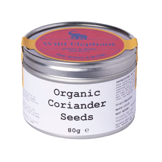 Organic coriander seeds from Wild Elephant in 80g pack, showcasing fresh, whole herb spice for cooking and seasoning.