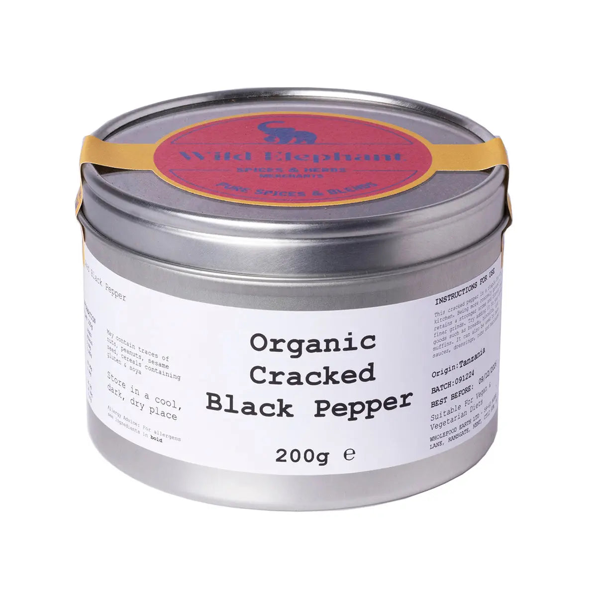 Organic cracked black pepper from Wild Elephant, whole herbs and spices in a glass jar, showcasing coarse black peppercorns.