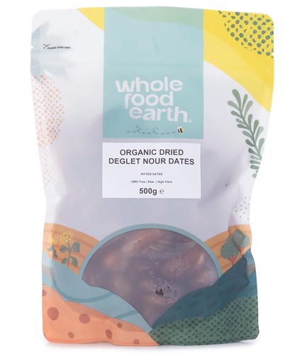 Organic Deglet Nour dates from Whole Food Earth, pitted dried fruit in a 500g package, showing glossy, golden dates.