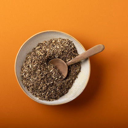 Organic dried thyme herb from Whole Food Earth, wild-harvested in 100g package, showcasing fresh green dried thyme leaves.