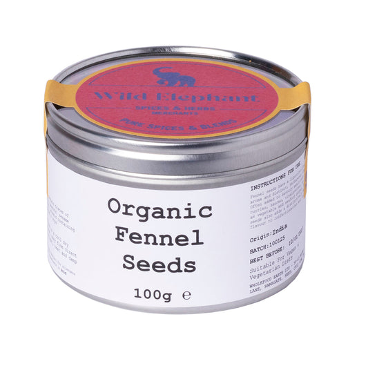 Organic fennel seeds from Wild Elephant in a 100g package, shown as whole aromatic seeds for herbs and spice use.