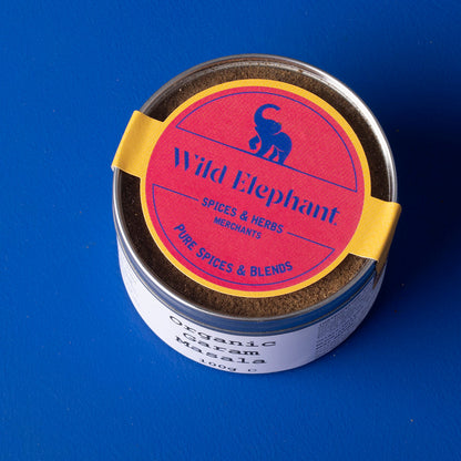 Organic Garam Masala spice blend from Wild Elephant, 100g, featuring a colorful mix of herbs and spices in a clear jar.