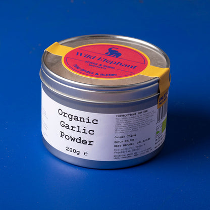 Organic garlic powder from Wild Elephant, 200g, shown in a clear container, part of Whole Food Earth's herbs and spices collection.