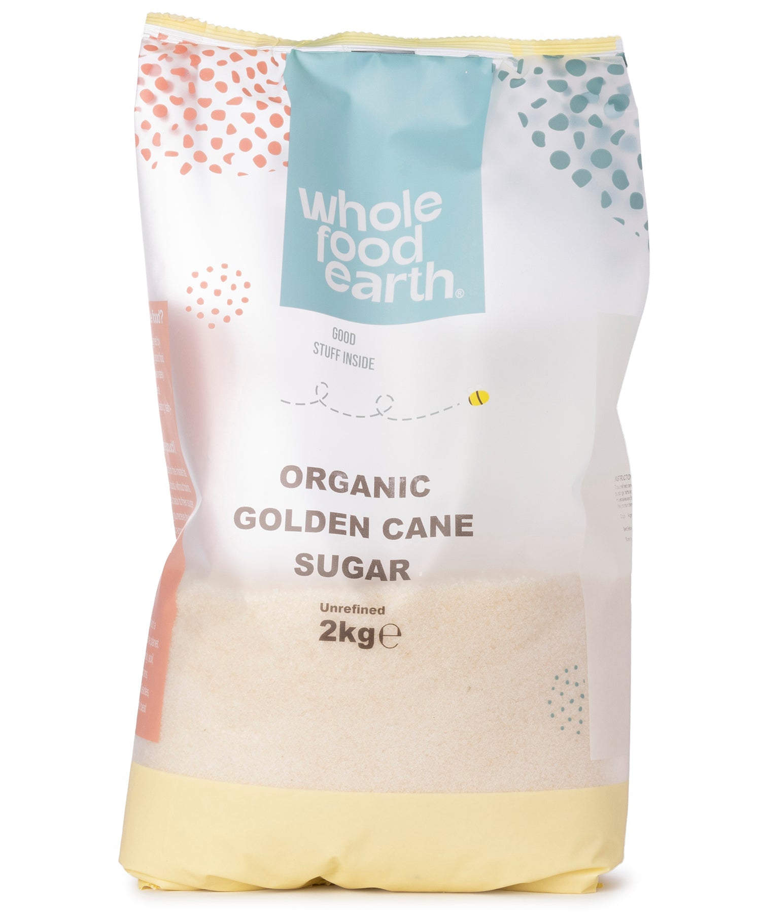 Organic golden cane sugar in a 2kg bag from Whole Food Earth, showing the natural golden color and textured surface.