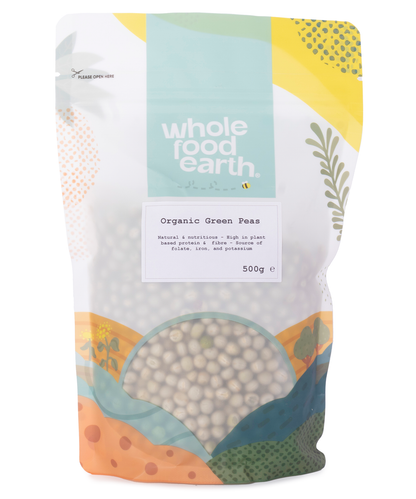 Organic green peas from Whole Food Earth in a 500g package, showing fresh, vibrant green peas ready for cooking or snacking.