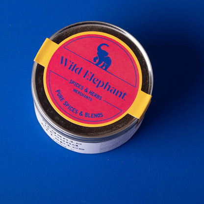 Organic ground allspice from Whole Food Earth, wild-harvested herbs and spices in a 100g package, shown in a clear image.