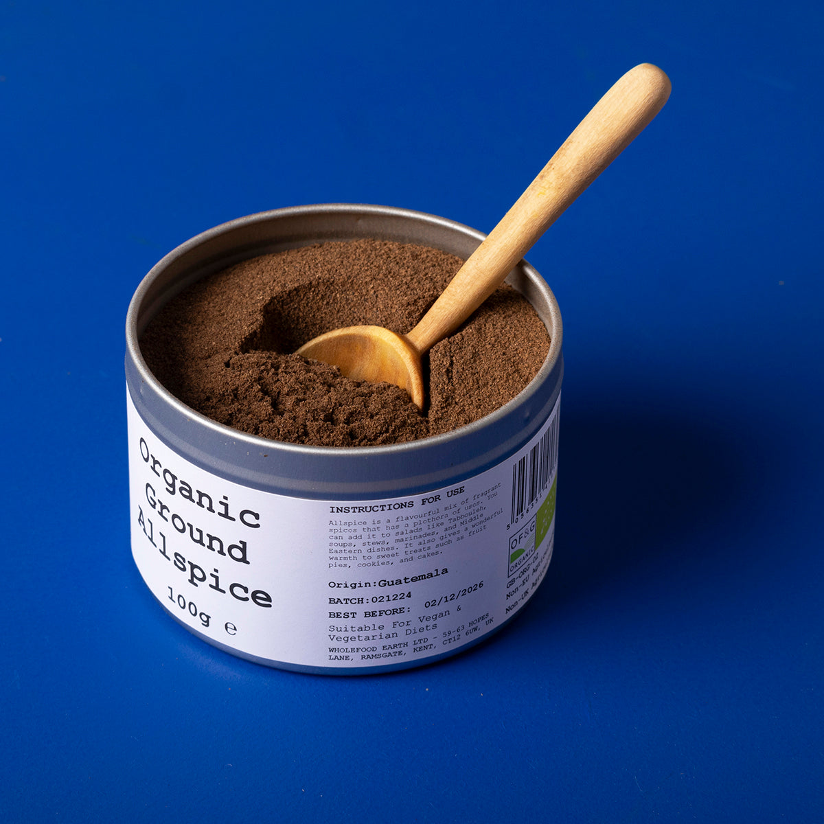 Organic ground allspice from Wild Elephant, a 100g jar of Whole Food Earth herbs and spices, showing the spice in a clear jar.