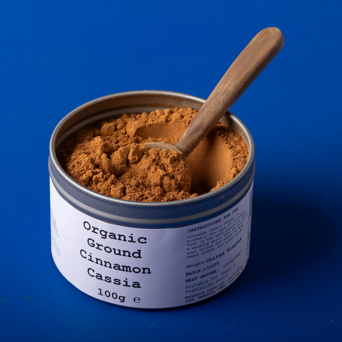 Organic ground cinnamon cassia from Wild Elephant, a natural herb and spice in a clear jar, showing the finely ground cinnamon.