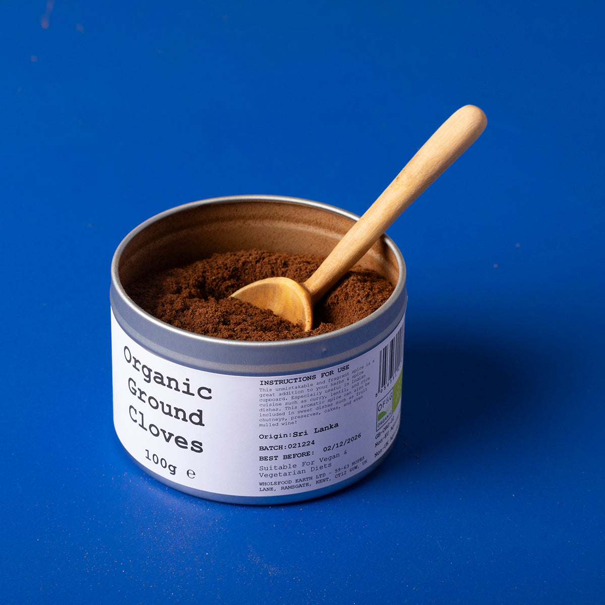 Organic ground cloves from Wild Elephant, 100g, in a clear jar, showcasing the rich brown spice used in herbs and spices collection.