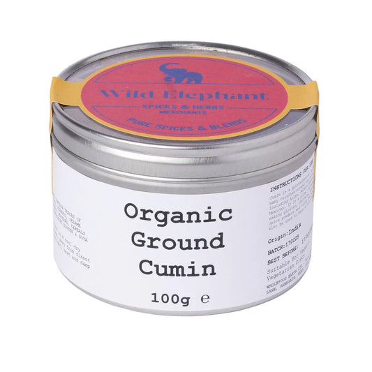 Organic ground cumin from Wild Elephant in a 100g package, showcasing fresh, aromatic cumin powder in a clear spice jar.