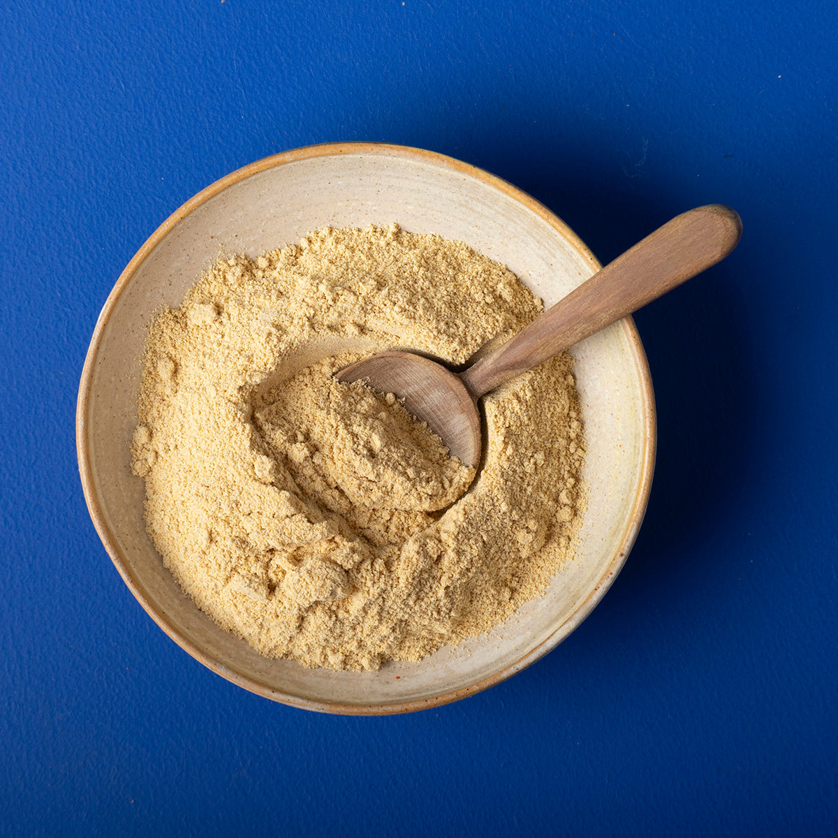 Organic ground fenugreek seeds from Wild Elephant, in a 150g package, showing fresh, golden-brown seeds in a clear container.