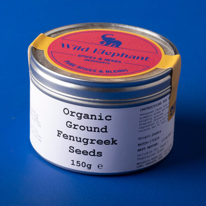 Organic ground fenugreek seeds from Wild Elephant in a 150g package, shown in a clear image highlighting the spice's texture.