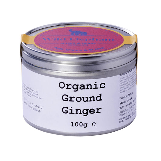 Organic ground ginger from Whole Food Earth, wild elephant brand, showing fresh, finely ground ginger in a clear container.
