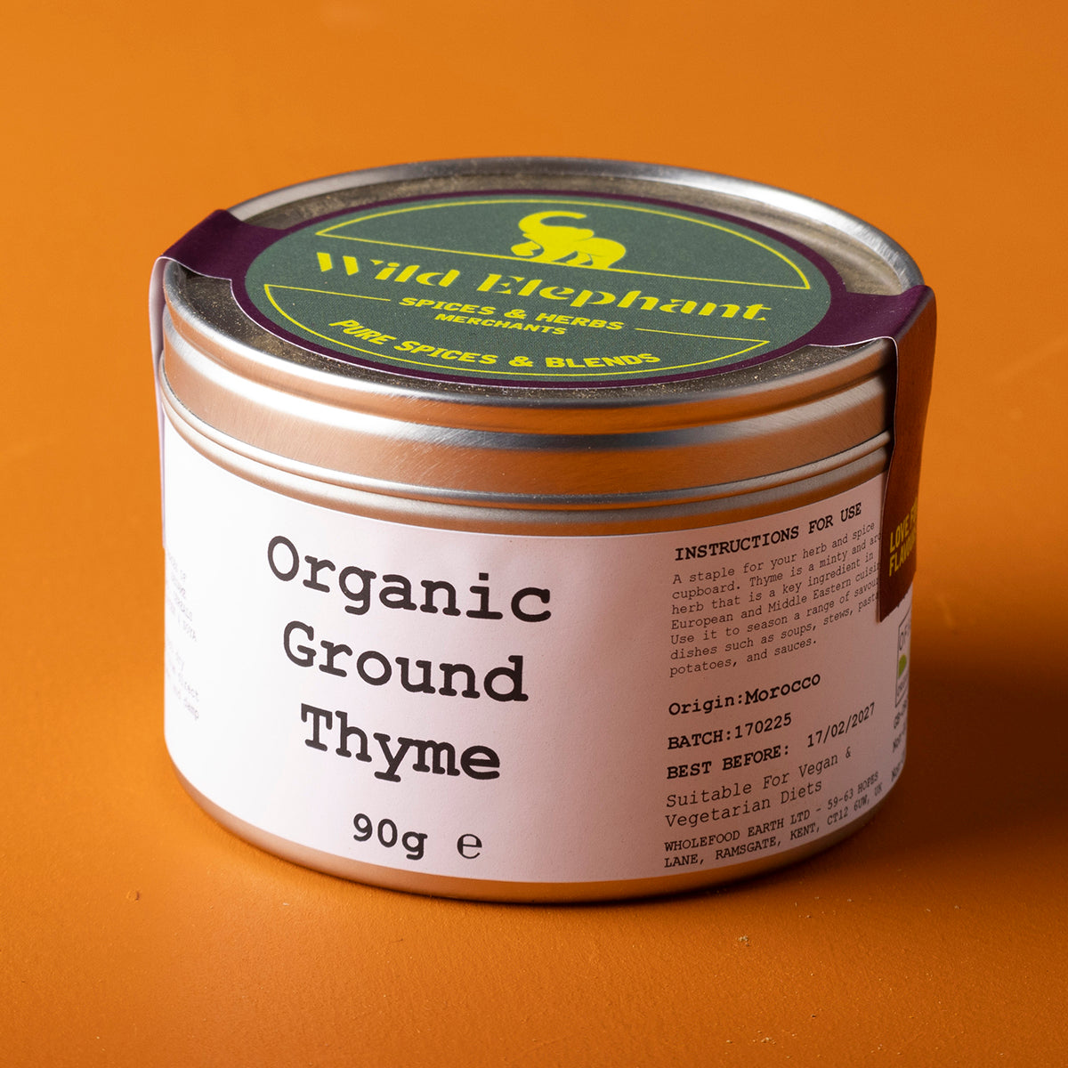 Organic ground thyme from Wild Elephant, 90g, in a clear jar, showcasing fresh, dried thyme leaves for culinary use.