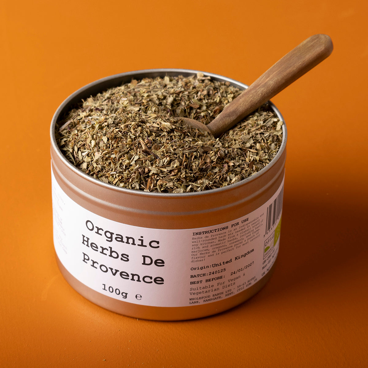 Organic Herbs de Provence from Whole Food Earth, wild herbs and spices in a 100g package, featuring dried lavender, thyme, and rosemary.