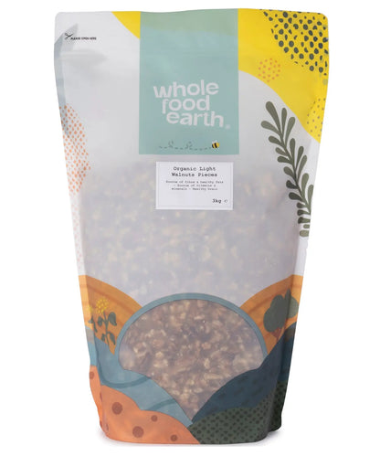 Organic light walnut pieces from Whole Food Earth in a 3kg bag, showing fresh, chopped walnuts suitable for snacking or baking.