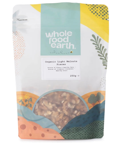 Organic light walnut pieces from Whole Food Earth, showing a close-up of crunchy, light-colored walnut nut bits in a 250g package.