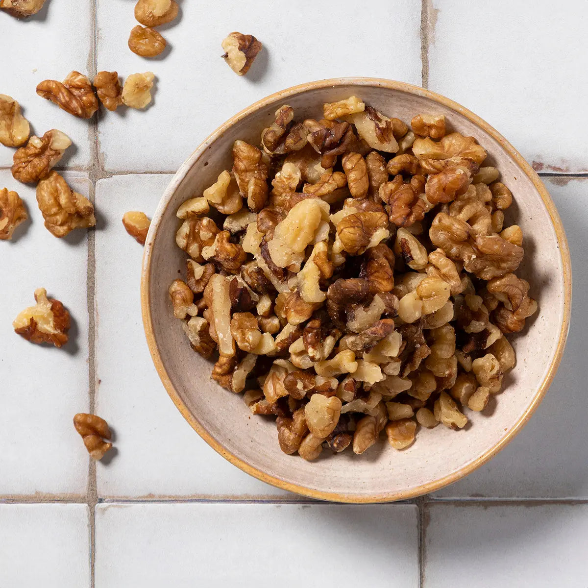 Organic light walnut pieces from Whole Food Earth, showing fresh, natural walnut halves suitable for snacking or baking.