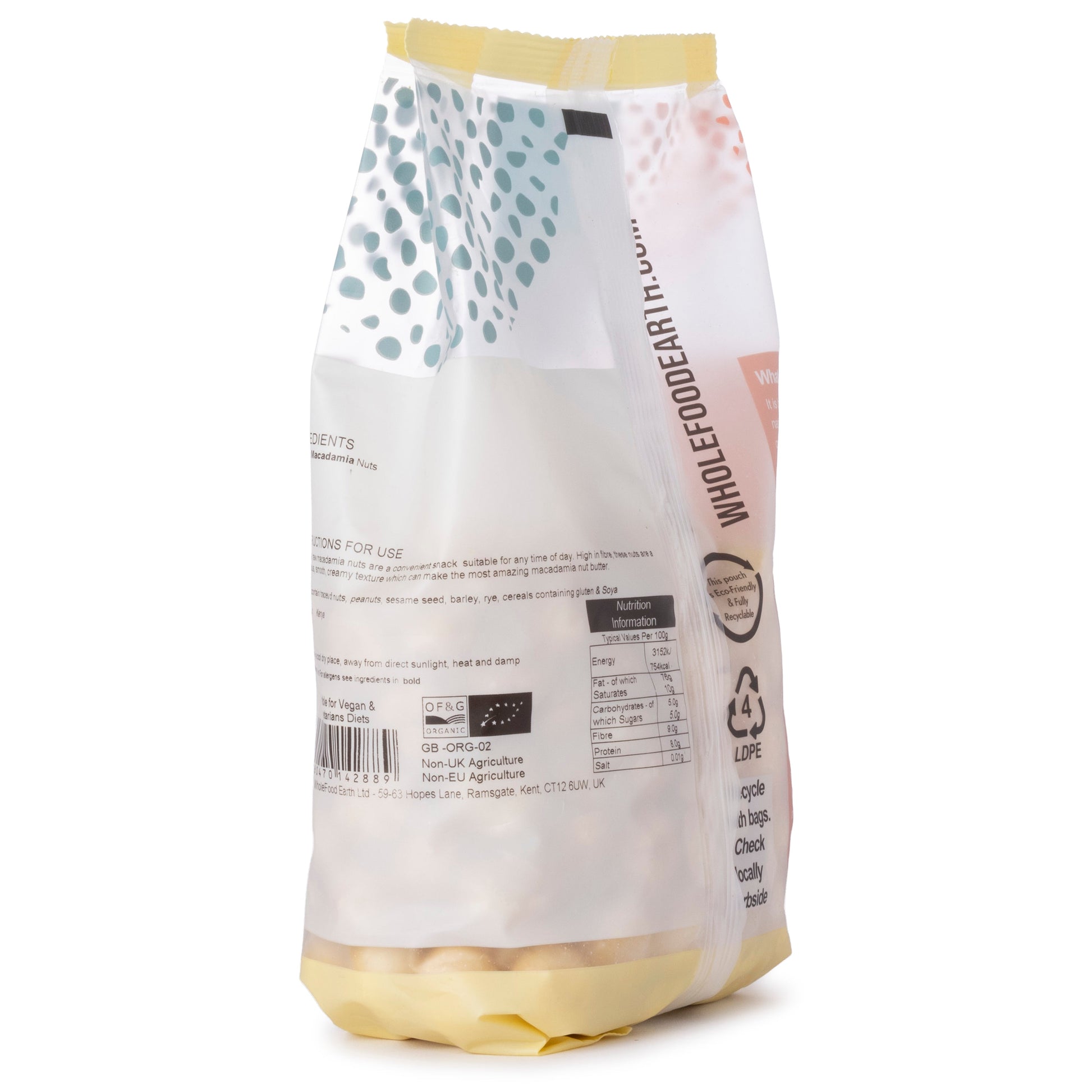 Organic Whole Food Earth macadamia nuts in a 500g package, showcasing creamy, whole nuts perfect for snacking or baking.