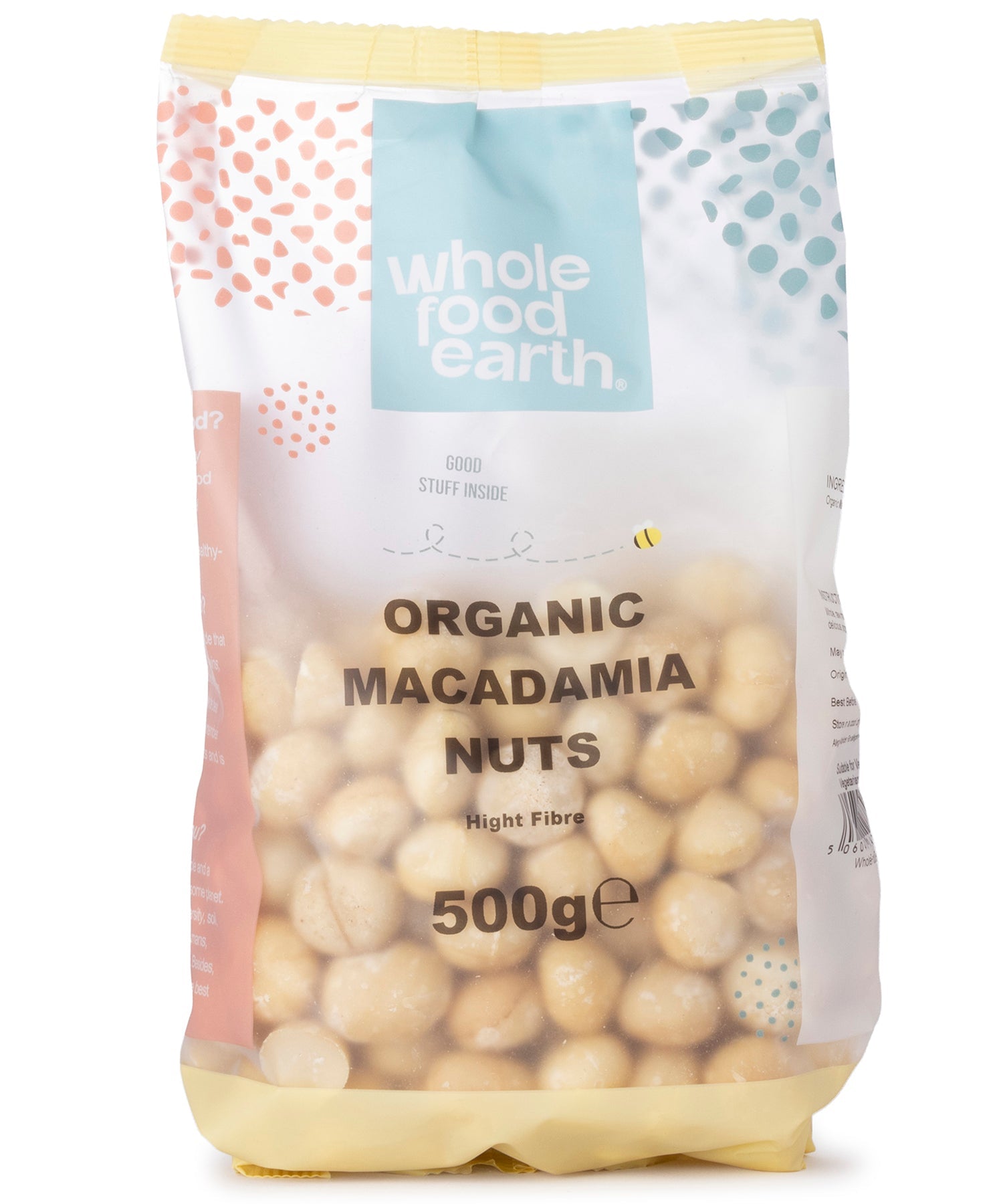 Organic Whole Food Earth macadamia nuts in a 500g package, showing whole, raw nuts with textured light brown shells.