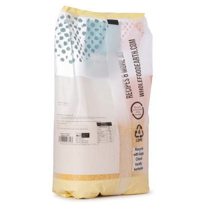 Organic millet grain from Whole Food Earth, showing a close-up of light yellow millet seeds in a 2kg bag.