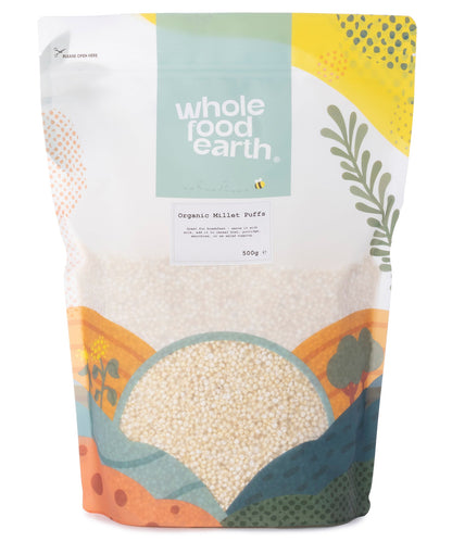 Organic millet puffs from Whole Food Earth, showing a 500g bag of crunchy, golden millet cereal grains in a bright kitchen setting.