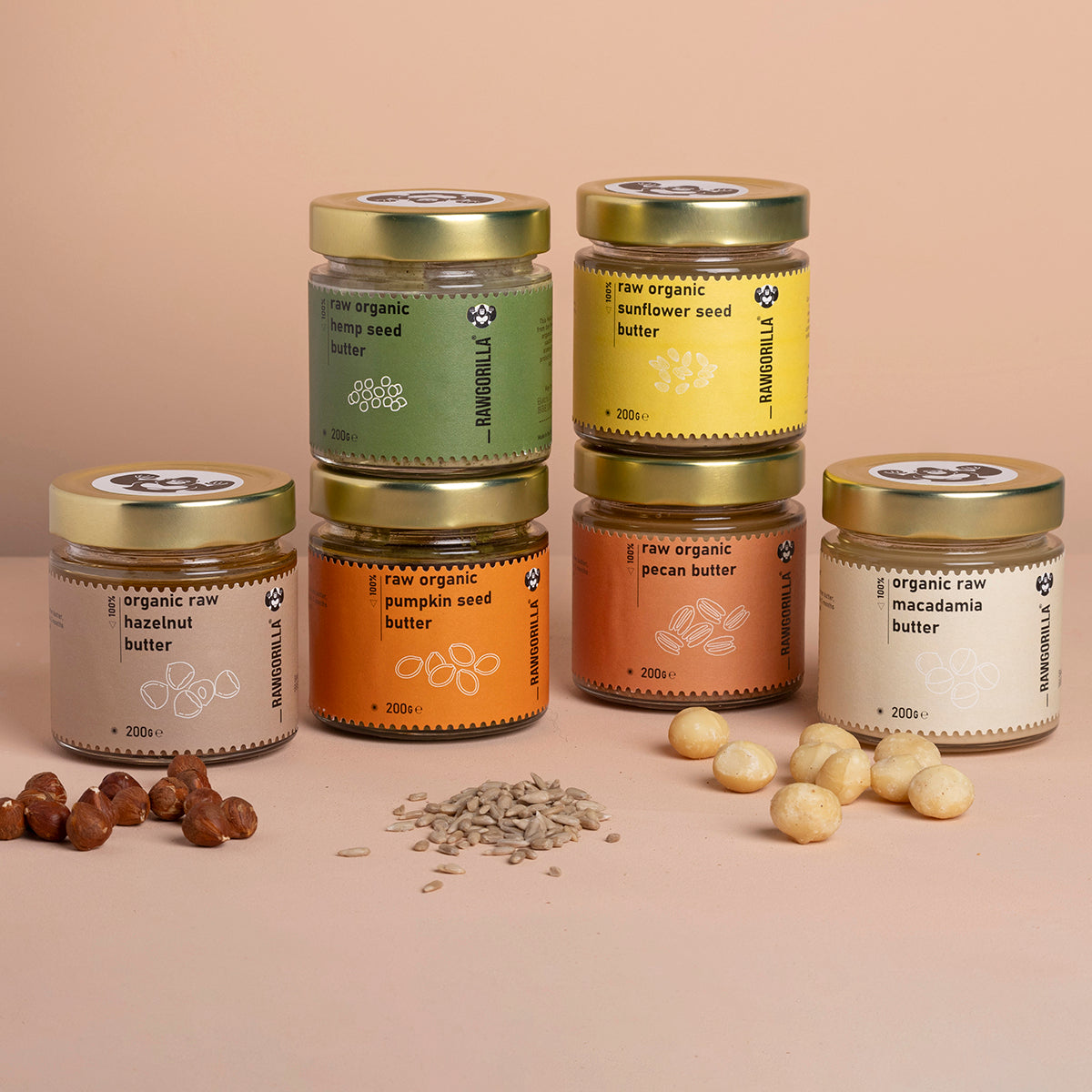 Assorted organic nut and seed butters in a selection box from Whole Food Earth, showing various jars with labels and nut spreads.