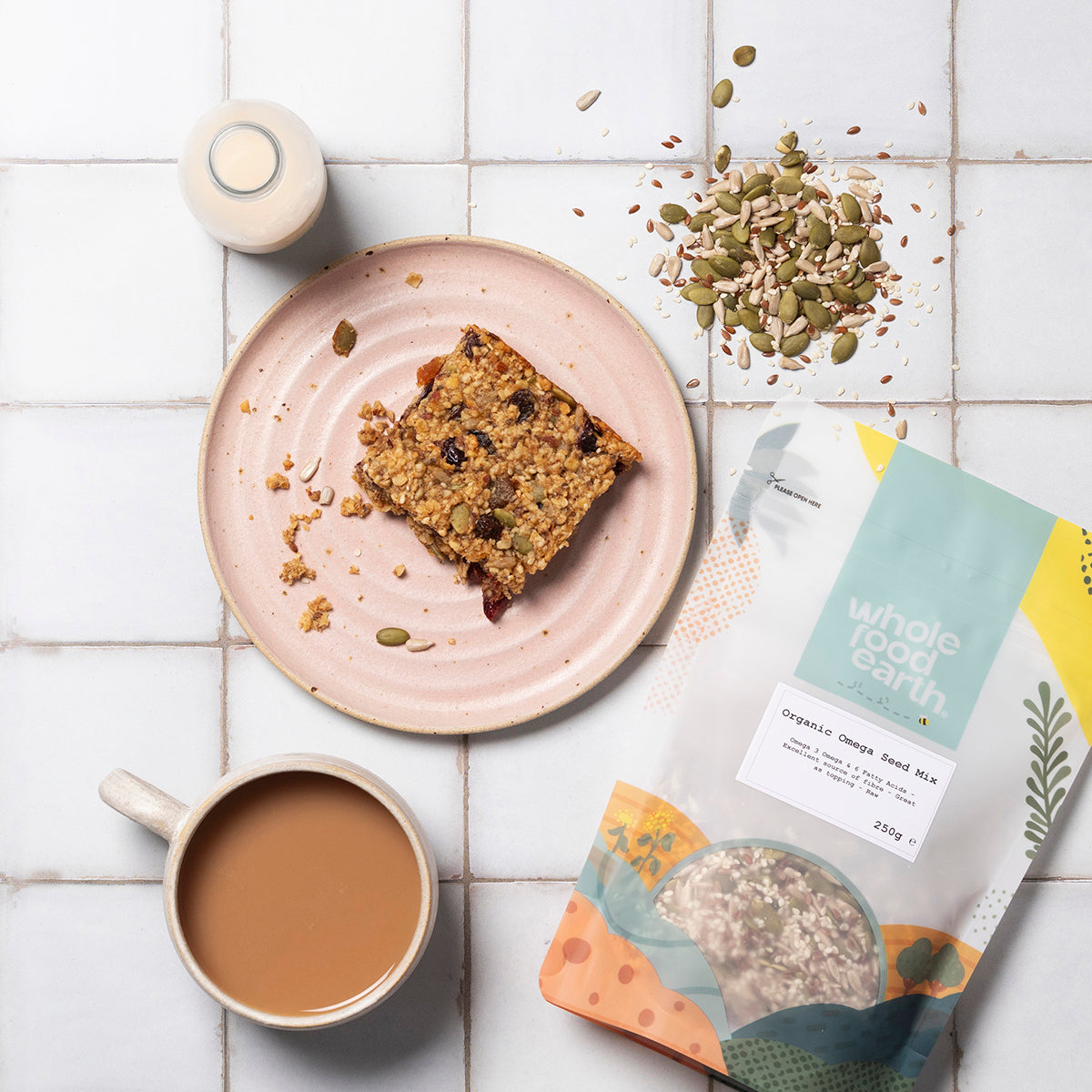 Assorted organic omega seed mix in a bowl, featuring a colorful blend of nutritious nuts and seeds from Whole Food Earth.