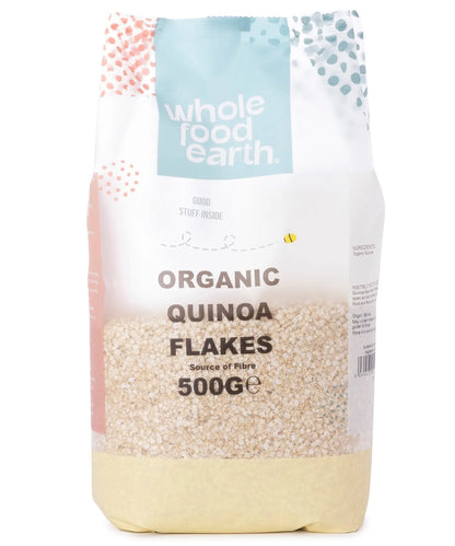 Organic quinoa flakes cereal from Whole Food Earth in a 500g package, showing light, fluffy quinoa flakes ready for breakfast.