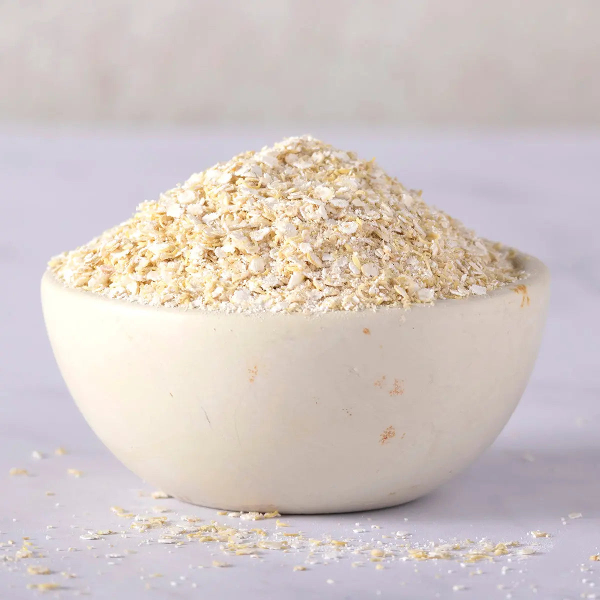 Organic quinoa flakes from Whole Food Earth, a healthy cereal option with visible flake texture and natural quinoa grains.