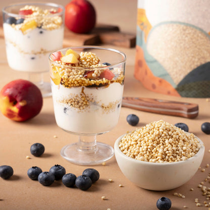Organic quinoa puffs from Whole Food Earth in a bowl, served as a healthy cereal with fresh fruit and milk.