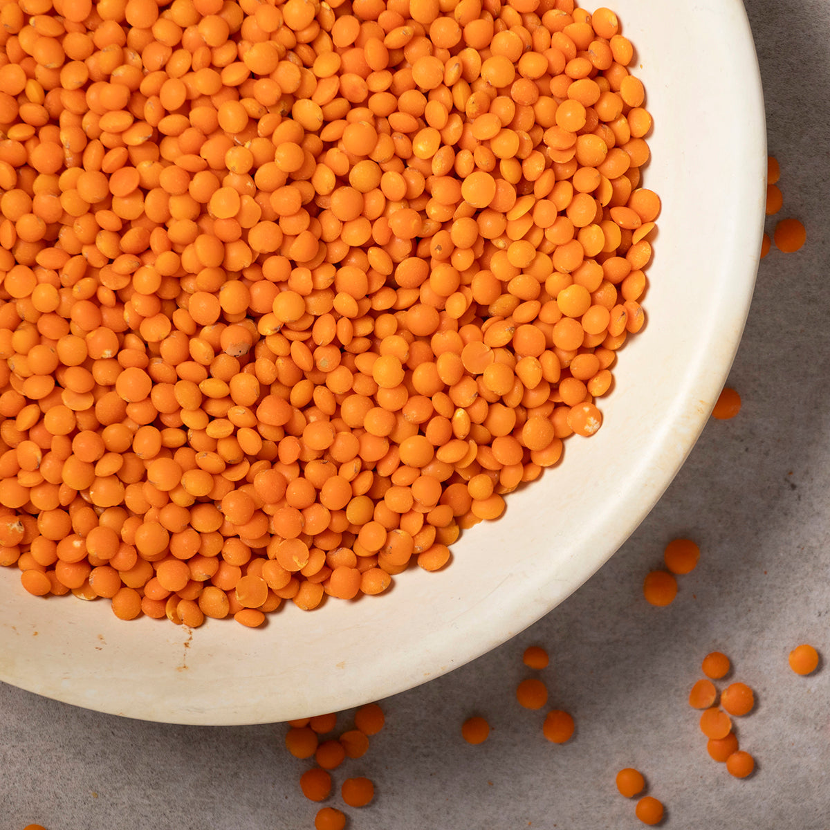 Organic red football lentils from Whole Food Earth, showing a close-up of the vibrant red beans used in healthy cooking.