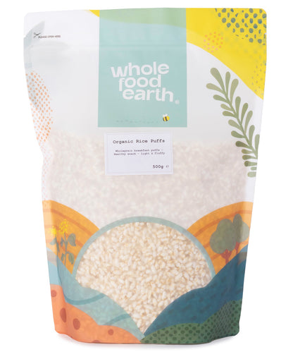 Organic rice puffs from Whole Food Earth, showing a bowl of crunchy, puffed rice grains in a clear glass dish.