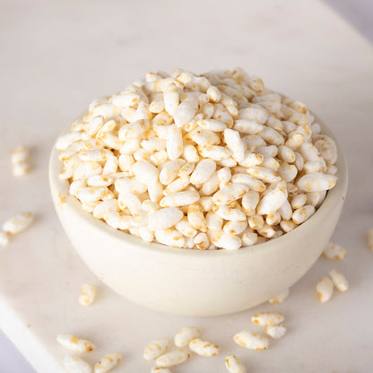 Organic rice puffs from Whole Food Earth, showing light, airy rice cereal grains suitable for snacks or breakfast.