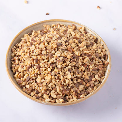 Organic roasted chopped almonds from Whole Food Earth, showing golden-brown chopped almonds in a bowl.