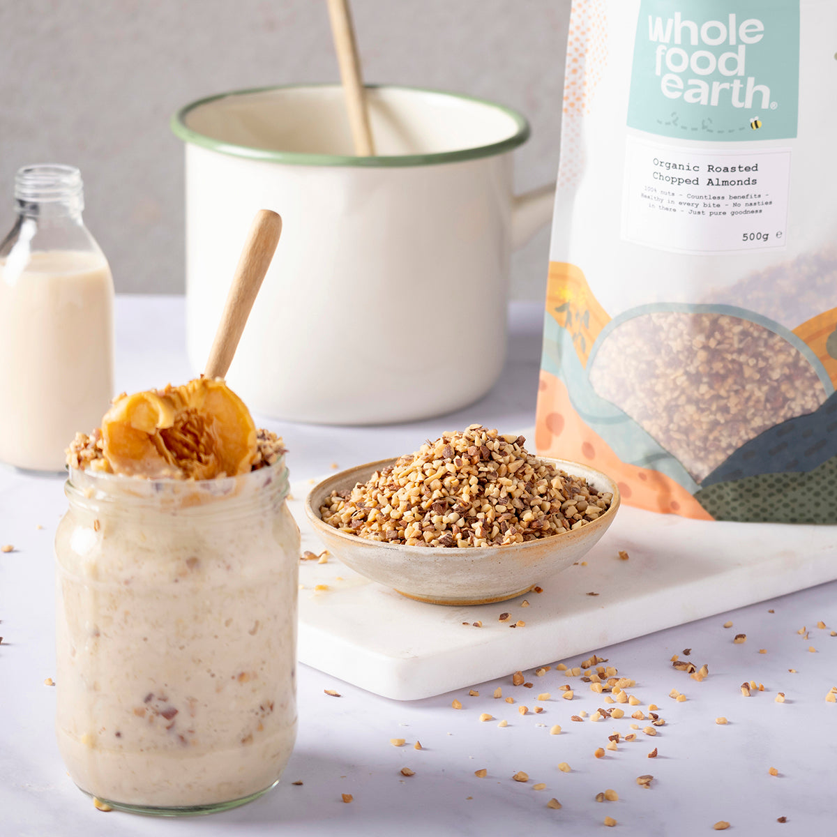 Organic roasted chopped almonds from Whole Food Earth in a bowl, showcasing their crunchy texture and natural golden color.