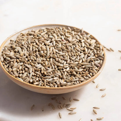 Organic rye grain from Whole Food Earth, showing whole, unprocessed rye kernels in a natural setting.
