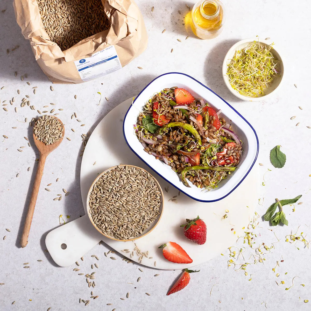 Organic Rye grain from Whole Food Earth, displayed in a natural setting with rye stalks and grains for wholesome baking.