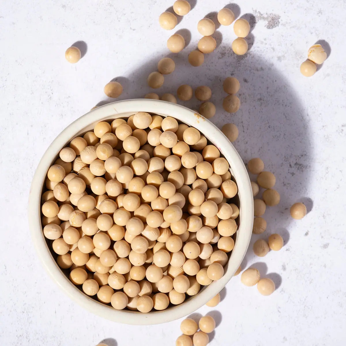 Organic soya beans from Whole Food Earth, displayed in a bowl with a close-up of the beans' texture and natural color.